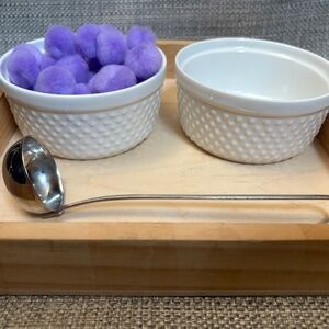 Practical Life Spooning w/ Mini Ladle and Purple Poms by Idlewild Montessori